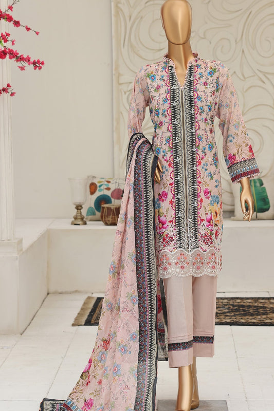 Floral dress with dupatta on a mannequin against a decorative wall.